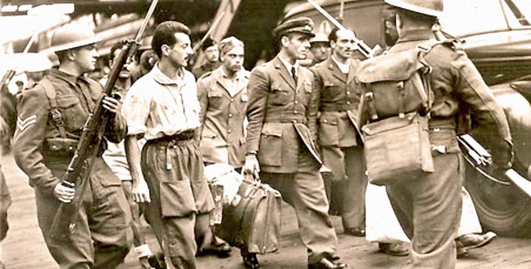 Soldiers and women during wartime, historical black and white photograph, vintage military scene, women in uniform, wartime history and news, archival music and news footage of World War II era from Past Daily.