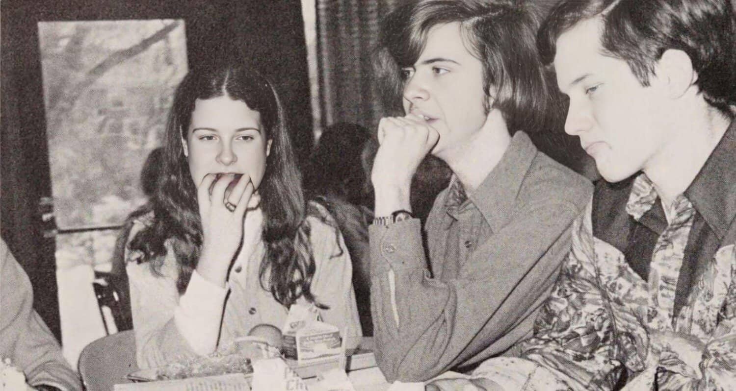 Teenagers listening attentively at a news and music archive event, capturing a nostalgic moment in media history, Past Daily: A Sound Archive of News, History, and Music representing vintage radio and cultural preservation.