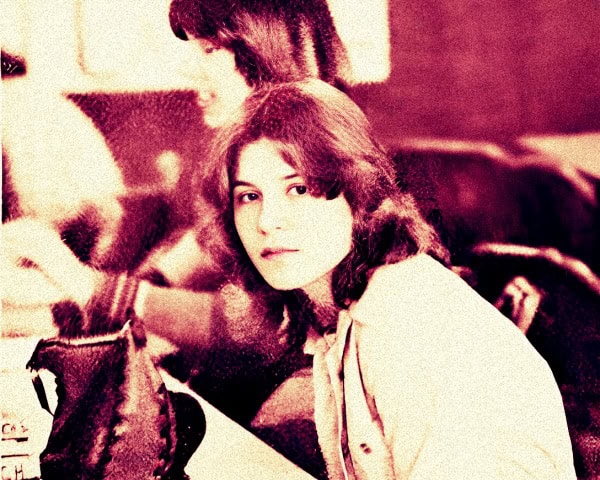 Vintage woman recording music in a studio, capturing the essence of classic music history and audio archives.