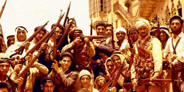 Massive group of historic fighters with rifles celebrating in a bustling street scene, capturing an important moment in history.