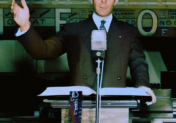 Microphone at a vintage newsreel or radio broadcast station, historical news reporting, classic media technology, vintage microphone setup, archival sound recording equipment.