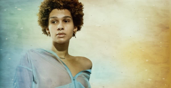 Vintage radio microphone with music notes and news elements representing Past Daily's sound archive of news, history, and music for nostalgic audio preservation and broadcasting.