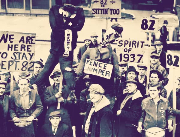 Activism protest historic workers rally public demonstration 1937 labor movement, activism, and historical protests in 1937. Image features a group of workers and activists holding signs during a rally, emphasizing the spirit of activism and social change.