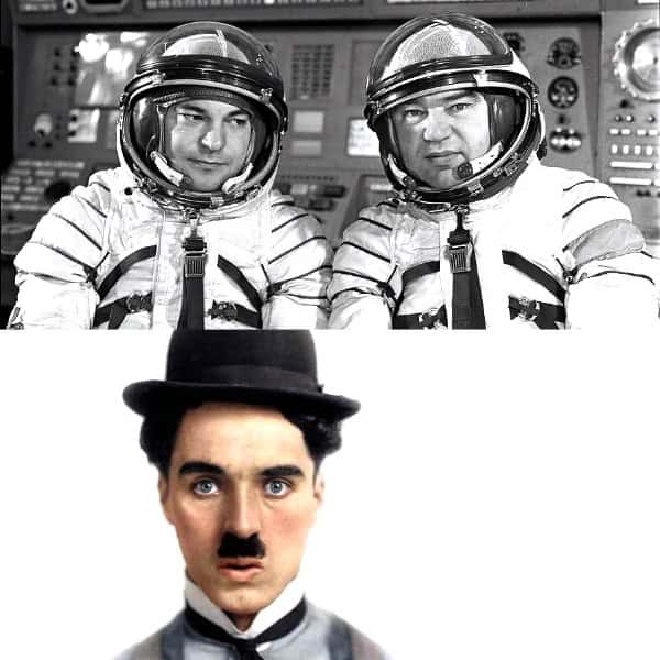 Astronauts in space suit, black and white photo, historic space exploration, vintage space mission, NASA astronauts, space program history.