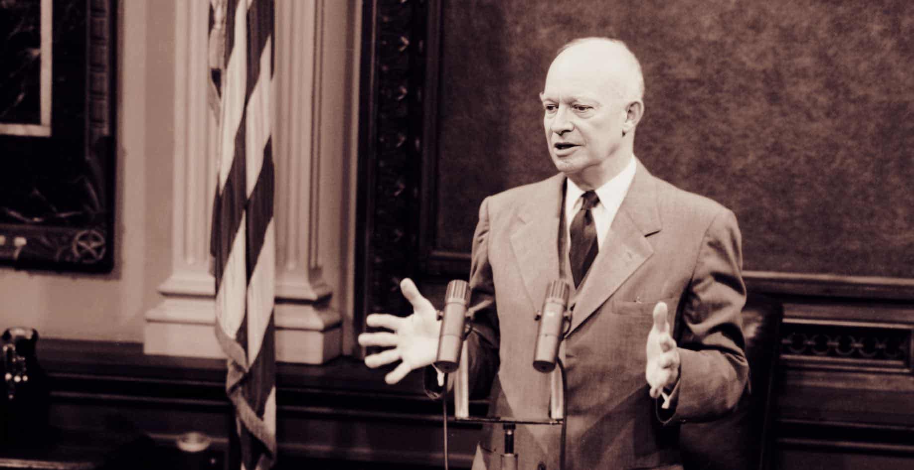 Vintage radio news broadcast featuring a man in a suit speaking at a microphone, symbolizing classic news archives and historical audio recordings.