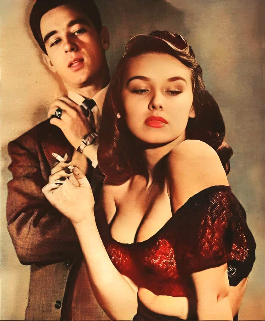 1920x1080 - Classic Hollywood style photo of a man and woman in vintage attire, representing timeless elegance, jazz age fashion, and romantic nostalgia relevant to music and film history.