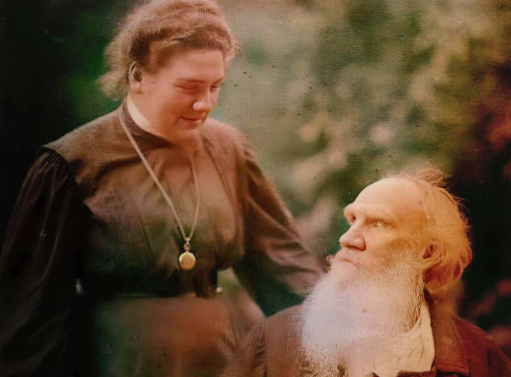 Old woman with gray hair and a young woman with reddish hair talking outdoors, representing the nostalgia and history of past news, music, and cultural moments from the Past Daily sound archive.