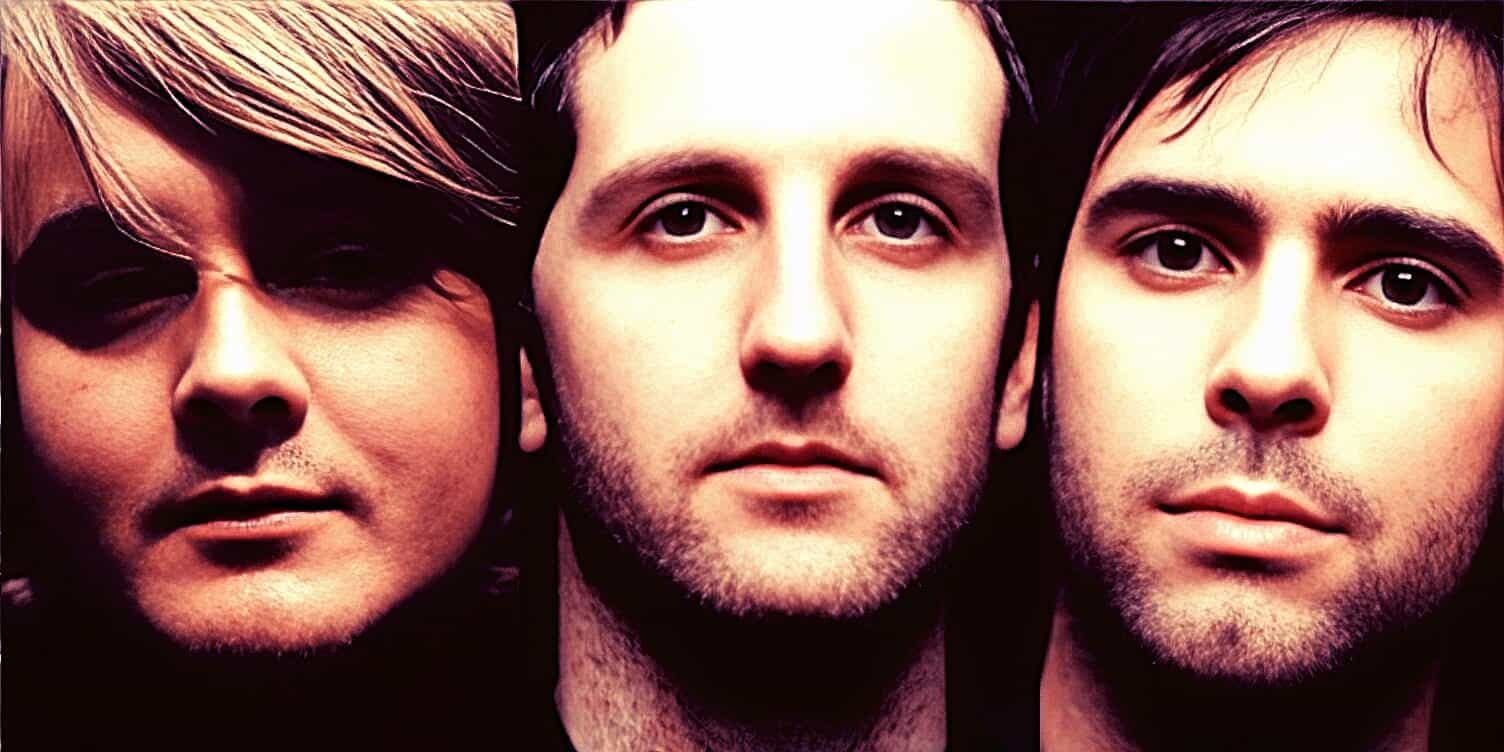 Close-up of three young men with different facial features, symbolizing music, news, and historical sound archives on Past Daily website.