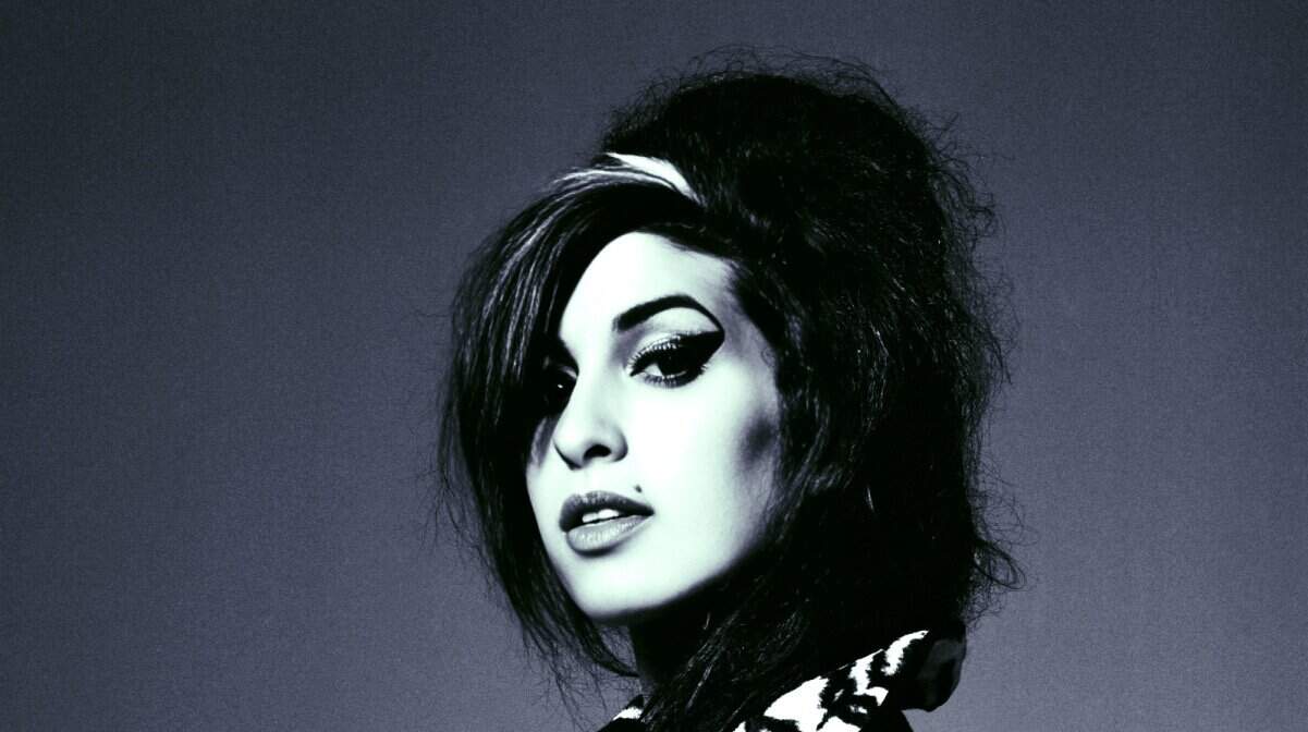 Bold woman with edgy hairstyle and dramatic makeup, symbolizing music and news history, representing Past Daily's sound archive of news, history, and music.