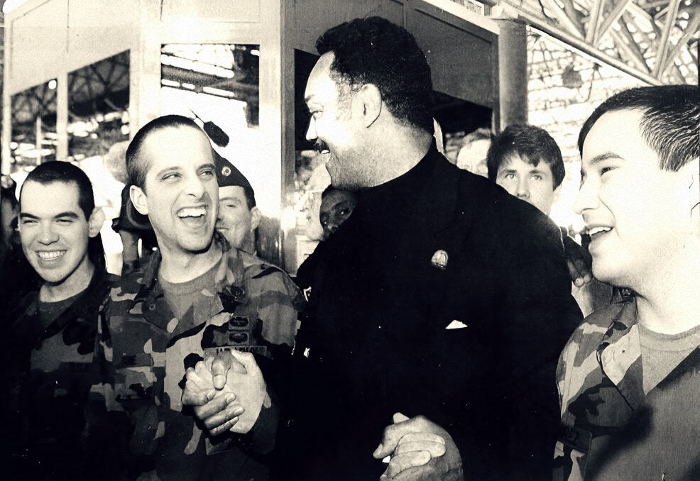 NY0JMKFJGH-001.jpg, Military personnel and a government official greeting each other, historic moment captured in black and white image, representing news coverage of political and military events, part of sound archive of news and history.