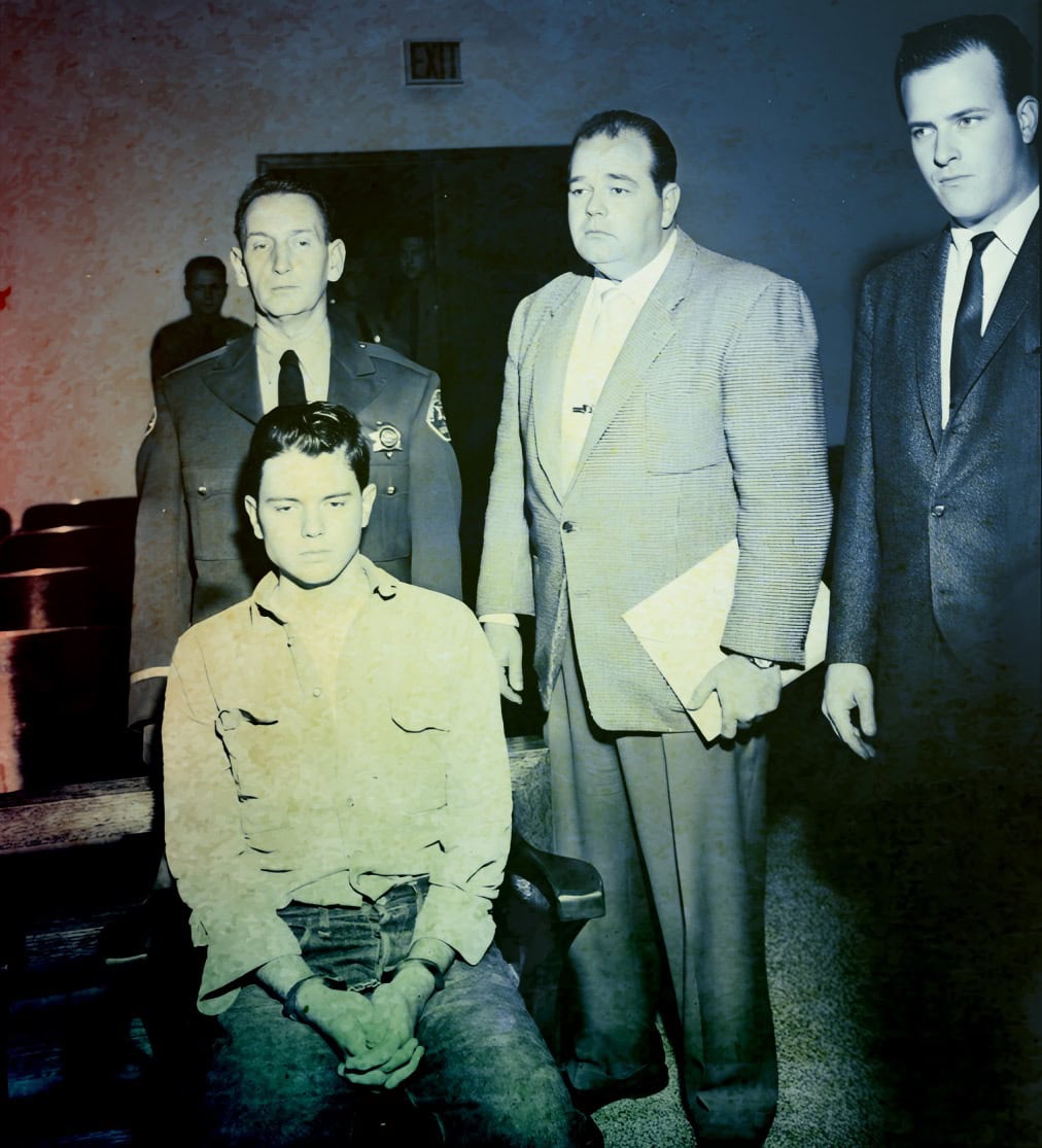 Police officers with young boy in meeting, vintage crime history, black and white photo of law enforcement, historical news archive, past daily sound archive.