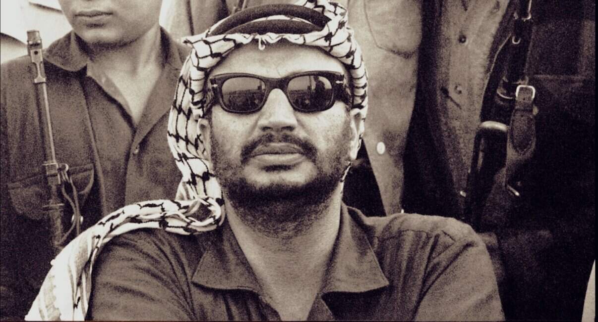 Microphone and crowd at music event, black and white photo, iconic live concert scene, historic music performance, vintage sound archive image, Past Daily news and music history collection.