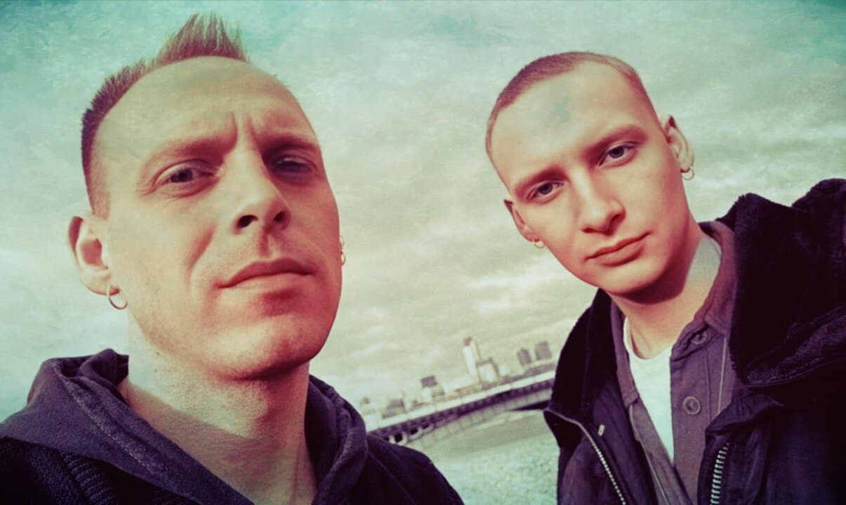 People listening to vintage radio recordings, representing the sound archive of news, history, and music at Past Daily.