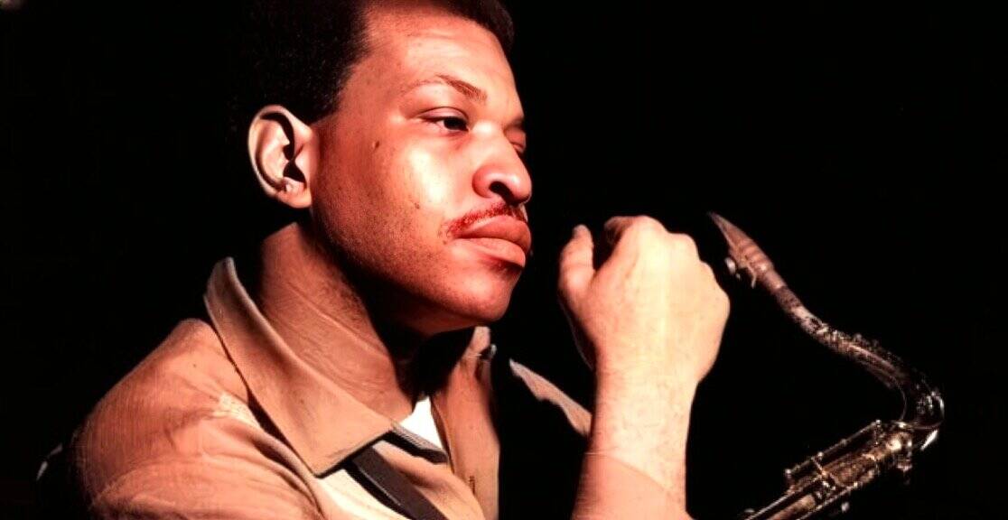 Single jazz saxophonist playing a soulful tune, capturing the essence of classic music and sound archives at Past Daily.