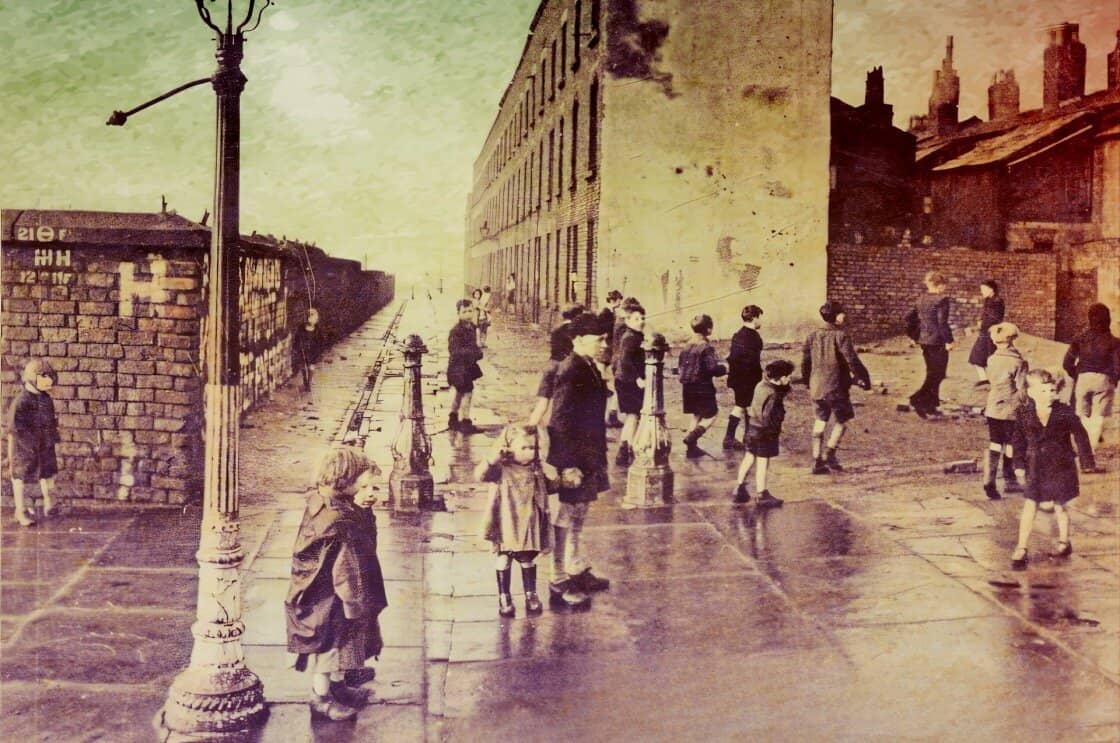 Children crossing a city street in an old historical photograph, showcasing early urban life and architecture, perfect for nostalgia, history, and vintage photo collections.